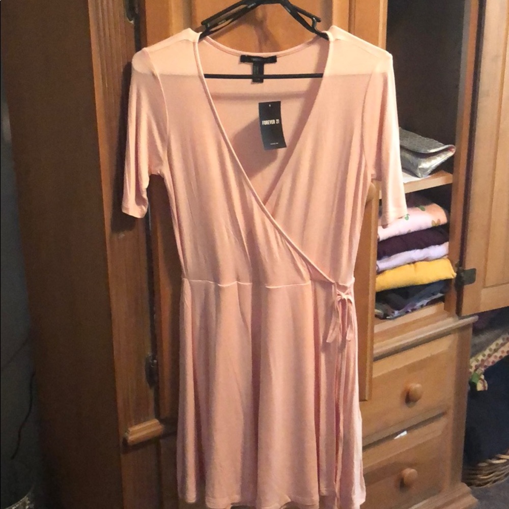 Deep V cut pale pink dress